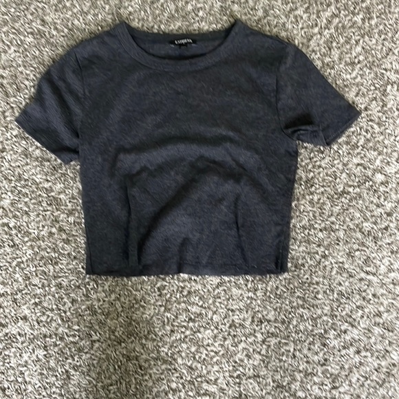 His is a cropped tee with nothing on it! Very easy to style and super cute! - Picture 1 of 2